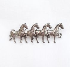 Vintage Sterling silver Horses brooch in excellent condition.  Brooch measures 1.75 by 0.5 inches, weighs 3.8 grams. Four Horses, Silver Horse, Pin Brooch, Sterling Silber, Vintage Sterling Silver, Silver Fashion, Brooch Pin, Favorite Jewelry, Brooches