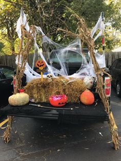 a truck with halloween decorations in the back