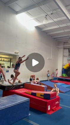 children are playing in an indoor trampoline course