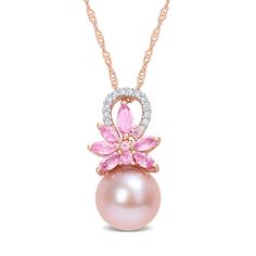 Bursting with sweet color and floral charm, this pink freshwater cultured pearl, pink sapphire and diamond drop pendant is destined to delight. Fashioned in 14K rose gold This drop features a lustrous 9.5-10.0mm round pink freshwater cultured pearl at the base. Multi-sized marquise-cut and round bright pink sapphires glisten above in a vibrant flower design. The diamond-lined loop adds a touch of sparkle. This 1/15 ct. t. w. diamond pendant suspends along a 17.0-inch Singapore chain that secures Elegant Pink Pearl Gemstone Necklace, Pink Akoya Pearl Wedding Necklaces, Pink Akoya Pearl Wedding Necklace, Pink Pearl Pendant Jewelry For Anniversary, Pink Akoya Pearl Necklaces For Wedding, Pink Akoya Pearl Jewelry With Pearl Drop, Pink Akoya Pearl Wedding Jewelry, Pink Pearl Drop Fine Jewelry, Pink Akoya Pearl Drop Jewelry