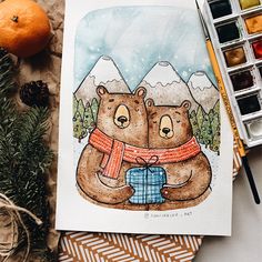 two bears are hugging each other in front of some pine cones and oranges on the table