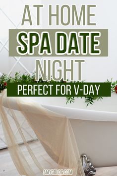 a white bath tub sitting next to a window with the words at home spa date night perfect for v - day