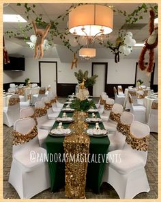 the tables are set up with green and gold linens for an elegant dinner party