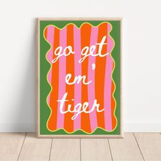 an orange and pink poster with the words go get em'tiger on it