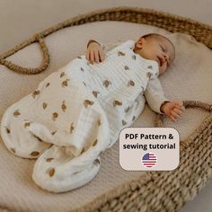 a baby sleeping in a basket with the words pdf pattern and sewing tutor on it