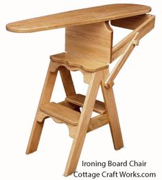 a wooden folding chair with an ironing board on it's backrests