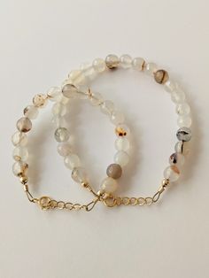 Beautiful neutral colored beads that match every outfit. The perfect accessory! All gold filled findings, so these last forever and never tarnish! Hypoallergenic Gold Beaded Bracelets For Birthday, Gold Beaded Birthstone Bracelets For Birthday, Everyday White Birthstone Bracelets, Everyday White Birthstone Bracelet, Gold Charm Bracelet With Round Beads For Birthdays, Nickel-free White Bracelets For Birthday, Baby Announcement Big Sister, Mini Bracelet, Mama And Mini