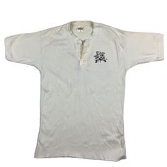 Vintage 70s End of the Trail cotton henley. Made in the USA. High-quality cotton. Tagged as large, measures more as a medium. 18 inches pit to pit, 25 inches long. No rips or tears. Faded. Cracking on the graphic. Free ship. Smoke and pet free home. End of the trail. 70s. USA made. Short Sleeve Cotton Henley With Buttons, White Cotton T-shirt With Henley Neckline, White Cotton Henley With Buttons, White Cotton Henley With Henley Neckline, Cotton Henley T-shirt With Buttons, White Henley Neckline Cotton T-shirt, White Cotton T-shirt With Button Closure, White Cotton Henley Neckline T-shirt, Cotton Henley Neckline T-shirt With Buttons