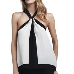 Nwt Bcbg Maxazria Womens Reversible Helena Top Sleeveless Size Xs White/Black Description: Condition: New With Tags Brand: Bcbg Maxazria Size: Xs Color: White/Black Colorblock Georgette & Opaline Grn V Neckline With Tie Option Reverses To Halter Neckline Sleeveless Relaxed Fit Hem Falls Below Hip Imported White Sleeveless Halter Top For Night Out, Chic White Halter Top, Chic White Halter Camisole Top, Chic Black Racerback Top, White Halter Top For Night Out, White Cami Halter Top For Night Out, Chic Racerback Tops For Day Out, Chic White Racerback Tank Top, Chic White Halter Sleeveless Top