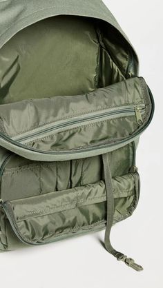 Fabric: 600D Polyester Canvas.Tonal design.Zip closure.Zip, slip, and patch interior and zip exterior pockets.Adjustable shoulder straps.Nylon lining.Weight: 21oz / 0.6kg.Imported, Vietnam Nylon Softback Bag For Outdoor Activities, Practical Nylon Backpack For Trips, Multifunctional Nylon Bag For Trips, Standard Nylon Backpack For Outdoor, Nylon Outdoor Backpack, Outdoor Nylon Standard Backpack, Outdoor Nylon Softback Bag, Nylon Softback Backpack For Outdoor, Functional Nylon Backpack With Zipper Closure