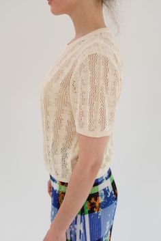 Hand knit in our exclusive bead lace design, ultra soft 100% Peruvian cotton t-shirt. Short sleeve with a classic boxy fit and crew neckline. Dress up or down. Runs true to size, with a natural gentle built in stretch, washable, not overly delicate. Total length from shoulder to hem of size s/m is 20.5". Made fairly by hand in Peru. Bead Lace, Bead Curtain, Cashmere Socks, Lace Tshirt, Beaded Curtains, Neckline Dress, Knit Outfit, Cotton Socks, Lace Design