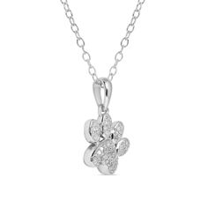 This cute little paw print pendant is adorned with sparkling round-cut white diamonds in pave settings. Beautifully-crafted in silver, this necklace includes a matching 18-inch cable chain and a spring ring clasp. Paw Print Round Pendant Jewelry As Gift, Silver Necklace With Paw Print For Gift, Elegant Sterling Silver Necklace With Paw Print, Paw Print Round Pendant Jewelry For Gift, Elegant Sterling Silver Paw Print Necklace, Silver Paw Print Round Pendant Necklace, Paw Pendant, Dog Paw Pendant, Paw Print Pendant