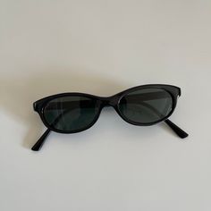 These MINI round oval sunglasses are your everyday classic. Featuring a black frame with black tint lens. This style is unisex. True genuine vintage sunglasses from the 90s.  400 uv  new vintage  includes sunglasses pouch   Style 008 Small Sunglasses 90s, 90s Sunglasses Aesthetic, Round Black Sunglasses, Dapper Day Outfits, Small Sunglasses, Sunglasses Pouch, Black Cat Eye, Dapper Day, Black Cat Eyes