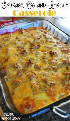 sausage egg and biscuit casserole in a glass baking dish with text overlay