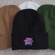 ゲンガ means GENGAR... A great gift or piece for winter wear. Direct embroidery, only available here at Embroidered Dad Hats! 🧢• Embroidered on a soft acrylic beanie.• Adult, one size fits all.• Free poly-bag shipping in 🇺🇸 (more options at checkout). Casual Beanie With Embroidered Logo For Winter, Casual Embroidered Logo Beanie For Winter, Casual Beanie With Embroidered Logo, Trendy Beanie With Embroidered Logo, Trendy Winter Hat With Embroidered Logo, Casual Winter Hats With Custom Embroidery, Casual Embroidered Beanie For Winter, Winter Embroidered Beanie, One Size Fits Most, Casual Embroidered Winter Beanie