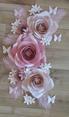 paper flowers are arranged on the floor