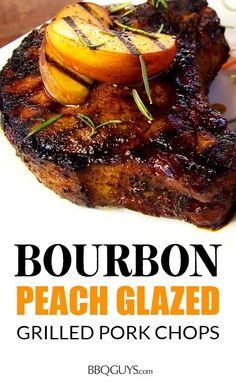 bourbon peach glazed grilled pork chops on a white plate