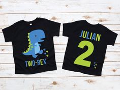 two children's t - shirts with dinosaurs printed on them