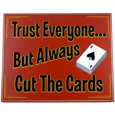 a red sign that says trust everyone but always cut the cards with playing cards on it