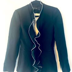 Zara- Black Blazer With Ruffle (Black With White Trim) Nwt - Never Worn, No Damage Fabric Is Thick And Of Exceptional Quality. Fit Is Trim - Shape Goes Slightly Inward At Waist New With Tags - Originally $150, I Paid $100 On Sale 49% Polyester, 48% Viscose, 3% Elastic *Pet Free/Smoke Free Home ! Spring Workwear Blazer With Ruffles, Chic Tailored Blazer With Ruffles, Spring Blazer With Ruffles For Workwear, Chic Tailored Ruffle Blazer, Spring Ruffled Blazer For Work, Spring Formal Outerwear With Ruffles, Chic Evening Blazer With Ruffles, Spring Formal Ruffled Outerwear, Long Sleeve Blazer With Ruffles For Evening