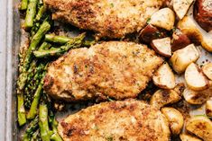 chicken chops, potatoes and asparagus on a sheet pan with broccoli