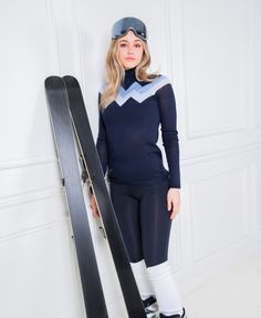 Chevron Merino Mock Neck Sweater in Navy with Light Blue Trim From the slopes to après ski? This sweater can take you there. Made to perform and then to play after, our newest knits are the perfect base layer to add to your winter ensemble. Made with 100% machine washable, water repellent Merino Wool to ensure you stay warm whether you're coming down a mountain or sipping a drink by the fire. For performance, wear as your winter sport base layer. For play, pair with jeans and your favorite boots Long Sleeve Tops For Ski Season And Winter Sports, Long Sleeve Tops For Ski Season, Long Sleeve Ski Tops For Ski Season, Long Sleeve Skiing Tops For Ski Season, Light Blue Trim, Tennis Fashion, Favorite Boots, Blue Trim, Mock Neck Sweater