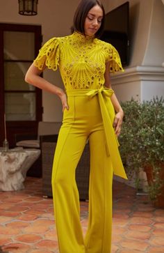 Elegant, Yellow lime lace-top jumpsuit with back zipper and same-fabric belt at the mid section. Comfortable, flared hems. •Model wearing size Small 𝑺𝒊𝒛𝒆 𝑪𝒉𝒂𝒓𝒕: • 2-4 Small • 6-8 Medium • 10-12 Large 𝑺𝒉𝒊𝒑𝒑𝒊𝒏𝒈 • This Item ships for free. 𝑹𝒆𝒕𝒖𝒕𝒏𝒔 • Returns (For store credit only) accepted within 30 days after your package has been delivered. 𝑪𝒂𝒏𝒄𝒆𝒍𝒍𝒂𝒕𝒊𝒐𝒏𝒔 • Can be canceled within 30 min. Lace Top Jumpsuit, Yellow Lace Top, Yellow Lime, Yellow Pants, Lace Jumpsuit, Jumpsuit Elegant, Yellow Lace, Gold Lace, Fabric Belt