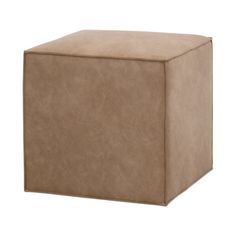 a large square ottoman with a brown leather cover on the top and bottom, sitting in front of a white background