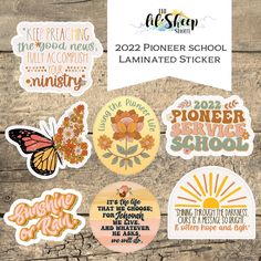 some stickers that have been placed on a wooden surface with the words, flowers and butterflies