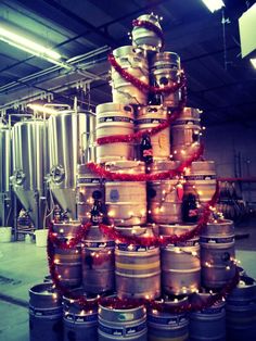 a christmas tree made out of kegs