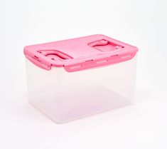 a plastic storage container with lid and latches on the sides, sitting on a white surface