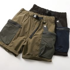 Introducing our TRENDY LARGE POCKET LOOSE QUICK-DRYING PARKA SHORTS. These stylish shorts are designed for the modern man on the go. With their quick-drying fabric, you'll stay cool and comfortable all day long. The large pockets provide ample storage space for your essentials. Available in a variety of sizes and colors, these shorts are perfect for any adventure. Upgrade your wardrobe with our best-selling mens shorts today! Cotton Shorts With Pockets For Streetwear, Shorts For Men, Solid Cargo Shorts With Pockets For Streetwear, Functional Pocket Cargo Shorts For Streetwear, Streetwear Shorts With Functional Pockets, Streetwear Nylon Cargo Shorts With Functional Pockets