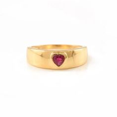 This is part of Chairish’s Fine Jewelry assortment.  Dainty Heart Cut Ruby Pinky Ring Signet Ring in 18K Gold featuring natural ruby of 0.25 carats. The gorgeous handcrafted ring goes with every style, every occasion or any outfit.  Ruby improves mental strength.  Designed with heart cut ruby bezel set in center, in a dome ring of solid gold in center that makes it a perfect fit to wear it on your occasion or style it with any of your basic outfit to give it a glam. This is a perfect Ruby Signet Ring. It can be a Bridal Shower Gift, Secret Santa Gift, Gift For Sister, Mother Daughter Gift, Bride To Be Gift, Bridesmaid Gift, BFF Gift, Best Friend Gift, Birthday Gift, Wife Gift, Christmas Gift or any Holiday Gift for Mother, Sister, Daughter, Grandma, Fiancé, Girlfriend, Valentine, Family or Classic Ruby Birthstone Promise Ring, Yellow Gold Ruby Promise Ring With Birthstone, Classic Heart-shaped Ruby Ring, Valentine's Day Ruby Yellow Gold Ring, Yellow Gold Ruby Ring For Valentine's Day Promise, Yellow Gold Heart-shaped Ruby Ring, Promise Ruby Birthstone Ring In Fine Jewelry Style, Yellow Gold Ruby Promise Ring For Valentine's Day, Ruby Gemstone Heart Ring For Anniversary