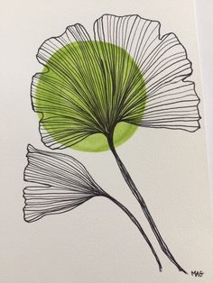 a drawing of a green flower on white paper