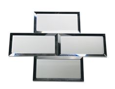 three rectangular mirrors are stacked on top of each other