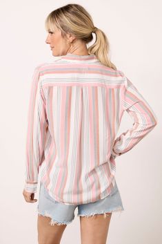 Elevate your button-down collection with the Wren Shirt from Rails, featuring a classic collar, front button closures, and a left chest pocket, perfectly finished in stripes. Pair with denim and flats for a chic and polished look. | RAILS Women's Wren Shirt, Size XS, Pink Casual Vertical Stripes Blouse For Fall, Casual Collared Blouse With Vertical Stripes, Spring Shirt With Vertical Stripes And Shirttail Hem, Fall Button-up Shirt With Vertical Stripes, Relaxed Fit Vertical Stripes Button-up Blouse, Spring Striped Shirt With Button Closure, Trendy Striped Button-up Shirt, Striped Shirt With Button Closure For Spring, Trendy Striped Shirt With Button Closure