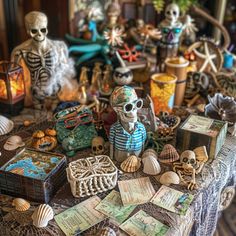 a table topped with lots of skeleton figurines next to boxes filled with books