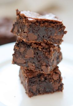 three chocolate brownies stacked on top of each other