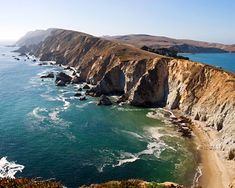 an aerial view of the ocean and coastline