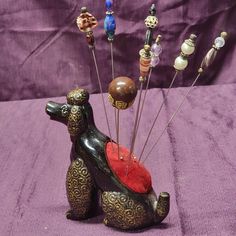 This vintage poodle hair pin holder was made in the 50's. Included are 8 hat pins. I have no information about their age etc. The poodle is 6 inches tall and 5.5 inches long. Made in Japan Poodle Hair, Pin Holder, Vintage Poodle, Stick Pins, Hair Pin, Hat Pins, Hair Pins, 6 Inches, Accessories Hats