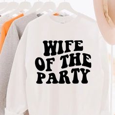 a white shirt with the words wife of the party printed on it