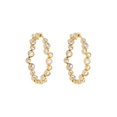 These vibrant 14k yellow gold hoop earrings feature a dazzling diamond bubble effect, perfect for making a statement. Total diamond weight: 1.59ct Total weight: 5.78g Dimensions: 1" inch Small Hoop Earrings In Yellow Gold With Sparkling Stones, Gold Diamond Hoop Earrings With Bezel Setting, Gold Hoop Earrings With Bezel Setting, Diamond Hoop Earrings, Gold Hoop, Gold Hoop Earrings, 1 Inch, Fine Jewelry, Hoop Earrings