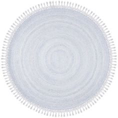 a white circular rug with fringes on it