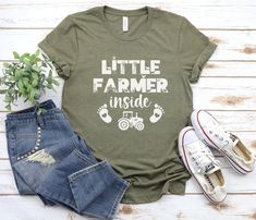 a t - shirt that says, little farmer inside with an image of a tractor