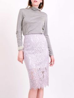 "This midi skirt is tailored from intricate cotton-blend lace that's partially lined with a tonal satin slip. It sits comfortably at the waist and has a back split for ease of movement. Style it casually with a blouse and sandals, switching to a blazer and stiletto heels for evening.  - Midi length, high-waist  - Lilac gray floral cotton-blend lace (*Can be customized in PINK, WHITE or BLACK lace upon request*)  - Exposed zip fastening at back  - 18% cotton 46% nylon 36%viscose; lining: 95% poly Spring Fitted Skirt With Lace Patchwork, Fitted Lace Patchwork Skirt For Spring, Elegant Gray Lined Skirt Bottoms, Elegant Gray Pleated Skirt, Elegant Gray Skirt For Spring, Elegant Gray Lined Skirt, Gray Formal Skirt For Spring, Summer Party Skirt With Lace Top, Chic Gray Pencil Skirt For Spring