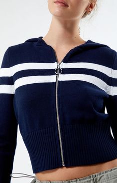 Wrap yourself in comfort and style with the LA Hearts Teagan Sweater Hoodie. This cozy yet trendy essential features a hood for added warmth, a full zipper front closure, and a knit fabrication, making it the perfect go-to piece for casual days or cozy nights.


	Striped pattern
	Knit fabric
	Attached hood
	Long sleeves
	Full zipper front closure
	Ribbed cuffs and hem
	100% cotton
	Model is wearing a size small Pull Bleu, Look Jean, My Mobile Number, Jeans Mom, Colorful Hoodies, Pacsun, Stripes Pattern, Sweater Hoodie, Front Zipper