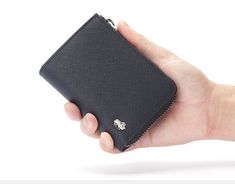 Chain Zipper RFID Blocking Wallet The Men's Chain Zipper RFID Blocking Wallet offers a secure and stylish alternative. The wallet is crafted from authentic cow leather and features an elegant square shape with a zip closure for ultimate security. Despite its compact size, it works as both a wallet and a purse. The built-in RFID blocking technology safeguards your credit cards from being stolen by hackers, while an attached chain ensures the secure storage of your wallet. This unisex wallet combi Modern Card Holder With Zipper Closure As Gift, Business Bifold Coin Purse With Zipper Closure, Business Bifold Coin Purse With Zipper, Business Wallets With Zipper Closure, Rectangular Shape, Business Wallets With Zipper Closure, Business Wallets With Zipper Closure In Rectangular Shape, Rectangular Business Wallets With Zipper Closure, Bifold Business Card Holder With Zipper Closure, Leather Card Holder With Zipper Closure