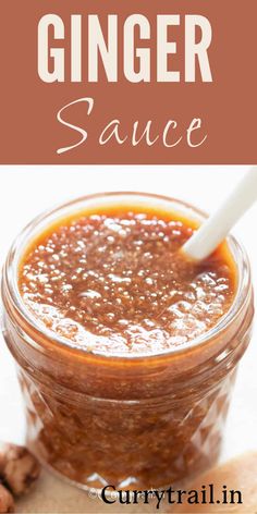 ginger sauce in a glass jar with a spoon and cinnamon on the side next to it