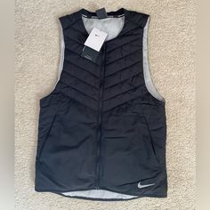 Nike Aerolayer Vest Size Small Color Black Nwt Functional Black Outerwear For Spring, Functional Black Spring Outerwear, Black Athleisure Outerwear For Cold Weather, Functional Black Vest For Fall, Nike Black Athleisure Outerwear, Fitted Nike Black Outerwear, Black Sports Vest For Winter, Black Winter Sports Vest, Sporty Black Vest For Spring