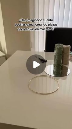 a white table with stacks of coins on it